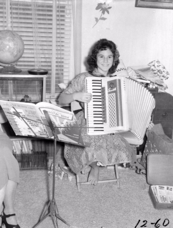 1960  Debra Stallings practicing her Accordion.